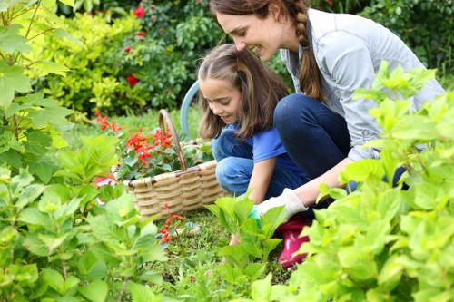 Team member reviewing garden maintenance notes