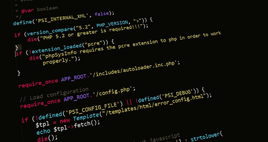 Close-up image of a computer screen displaying lines of colorful HTML code, including tags such as <ul>, <li>, and <a>, with syntax highlighted in pink, yellow, and green on a dark background. The cod